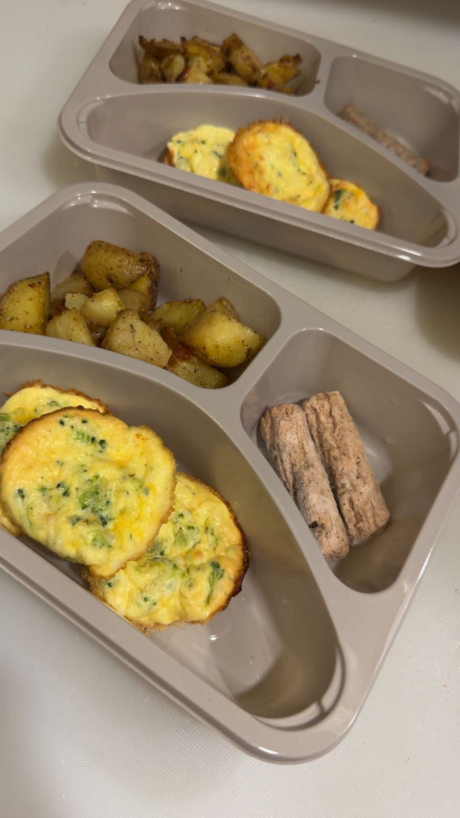 Breakfast trays with egg bites and potatoes